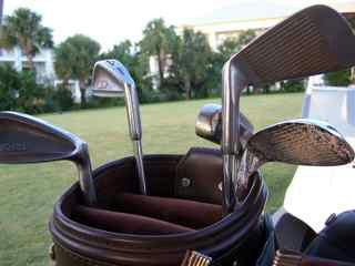 A set of golf clubs for a Titleist Vokey SM11 review of loft and grind
